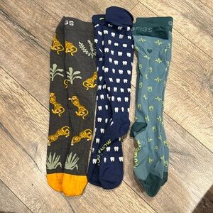 3 pairs of figs socks. Only worn a few times.  Size small